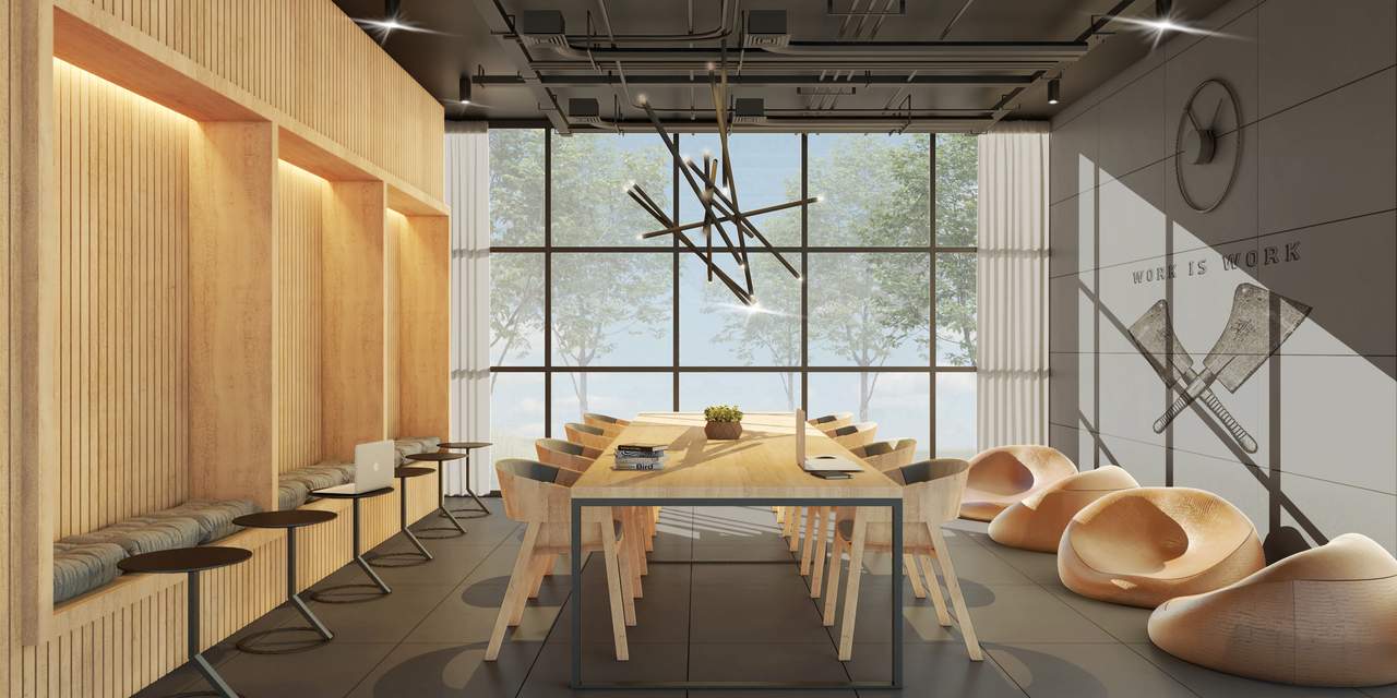 Espacio cowork con mesa de trabajo